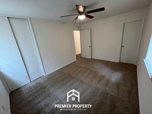 Building Photo - Spacious 3BR/2BA Home with Den & Living Room | Brick Fireplace & Large Yard