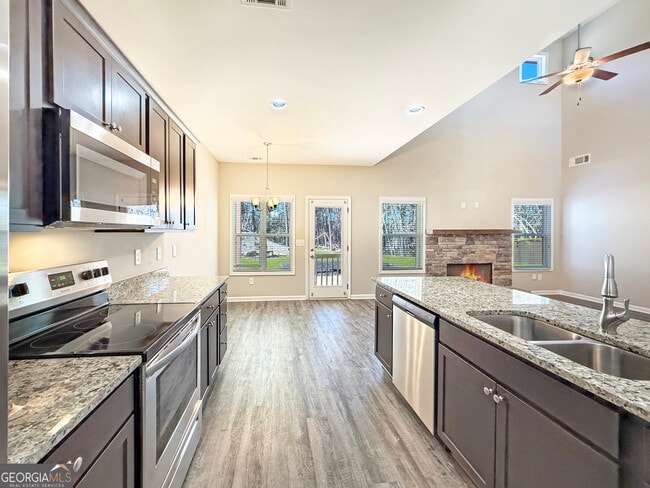 Building Photo - 6369 Woodland Station Dr