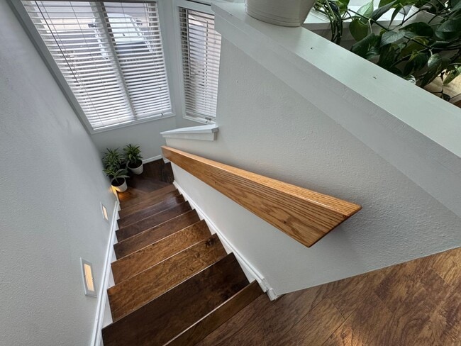 Building Photo - Bright 2BR Townhome with 3 Balconies & Private Patio