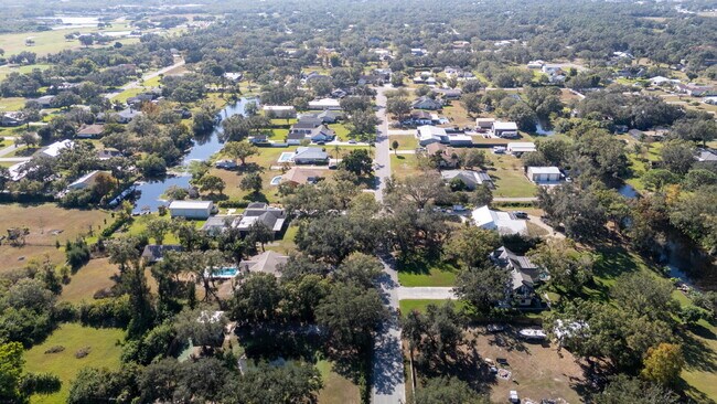 Building Photo - Country-Style Sarasota Living on a Full Acre - Pool Home with Oversized Workshop — Move-In Ready Now