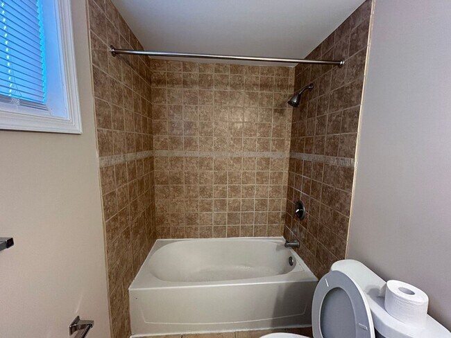 Building Photo - Welcome to this charming Ranch style home!