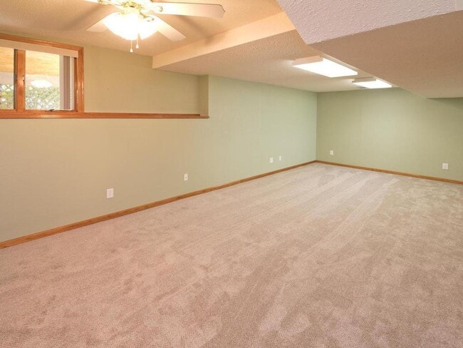 Building Photo - Elegant 2-Story has 4 BRs on Upper Level, Office, 2 Family Rooms, Fireplace & More!
