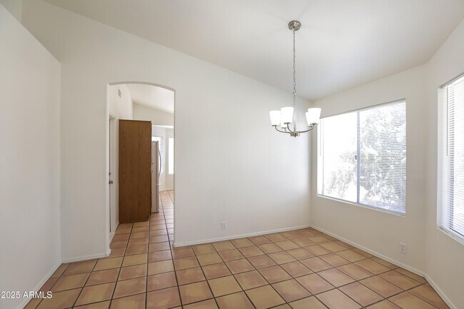 Building Photo - 8876 W Michelle Dr