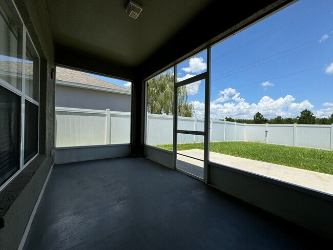 Building Photo - Beautiful 3/2 home near Lake Nona ~ Fenced In Yard ~ LVP & Tile Flooring ~ Community Pool!