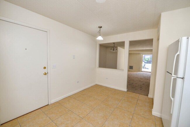 Building Photo - 8751 W Catherine Ave