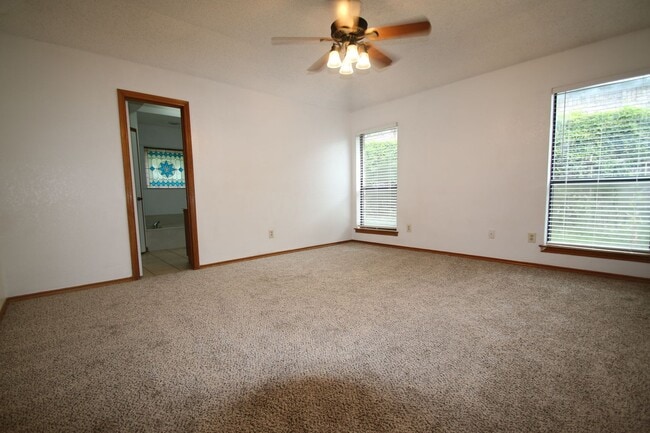 Building Photo - Corner Lot Charmer Off Chapel Creek | 4BR/2BA with Fireplace, Garden Tub & Fenced Backyard