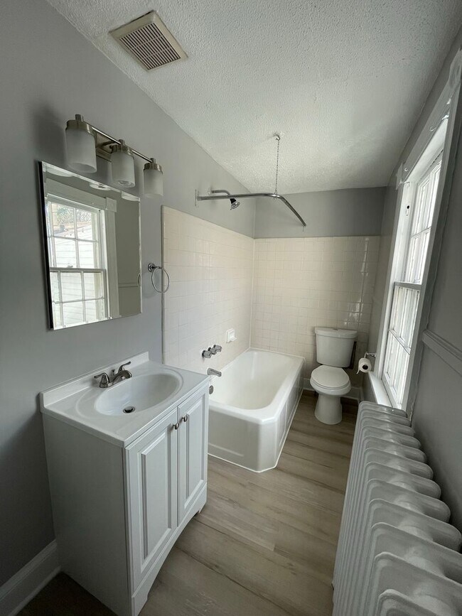 Building Photo - Small pets are welcome with an additional deposit and monthly pet rent.