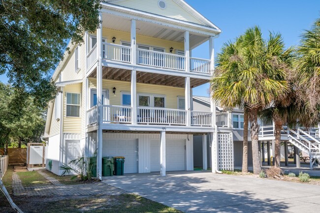 Building Photo - PRICE REDUCTION! LIVE AT THE BEACH FOR THE...