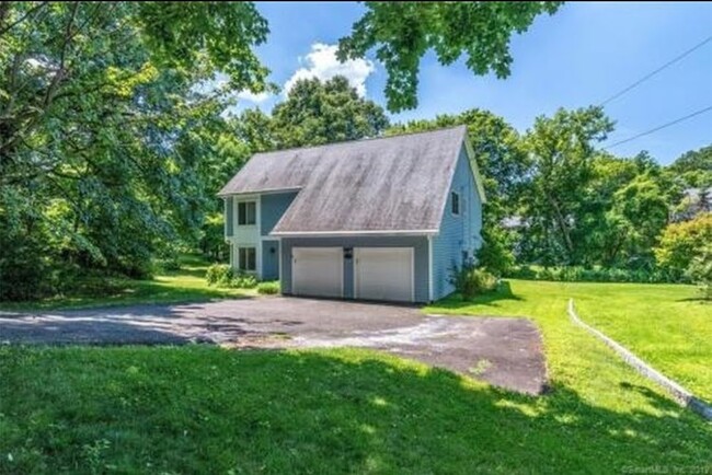 Entry view with 2 car garages, generator - 35 Homestead Rd