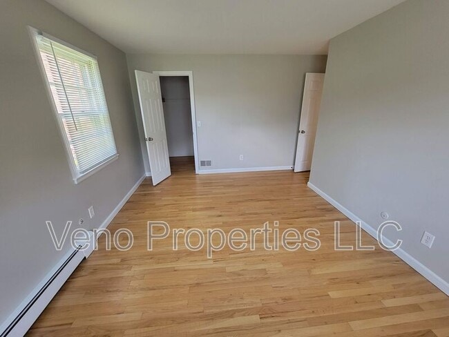 Building Photo - 9/11/13 Village Dr.