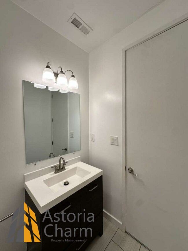 Building Photo - Beautifully Renovated 3BR Rowhome Near Johns Hopkins – Gated Parking + Modern Upgrades