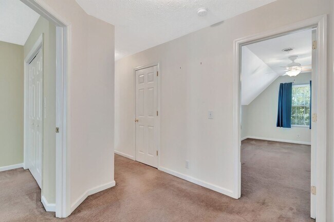 Building Photo - One acre lot with first floor suite in bea...