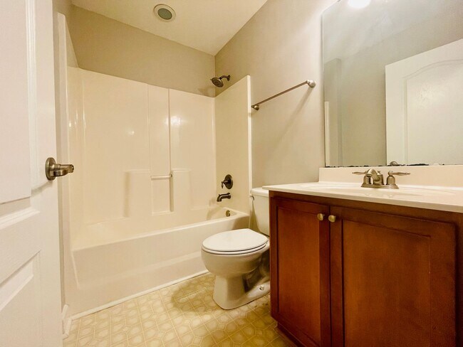 Building Photo - BRAND NEW FLOORING & FRESH PAINT - 3 Bedroom/2.5 Bath Townhome with garage in Wild Wing!