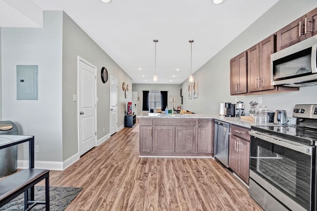 Building Photo - Legacy Executive Retreat | Modern 2BR Townhome for Professionals & Extended Stays