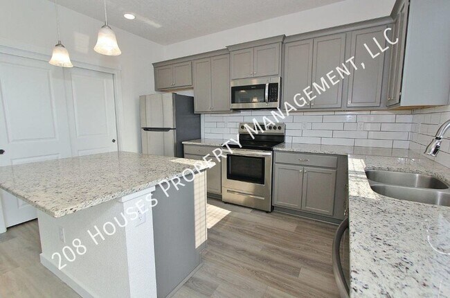 Building Photo - Modern townhouse in a Cozy Community. 50% ...
