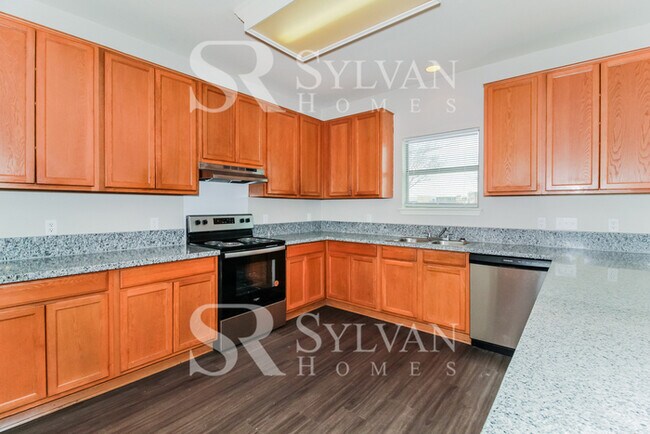 Building Photo - Turn the key. Enter. Smile. Repeat every day!