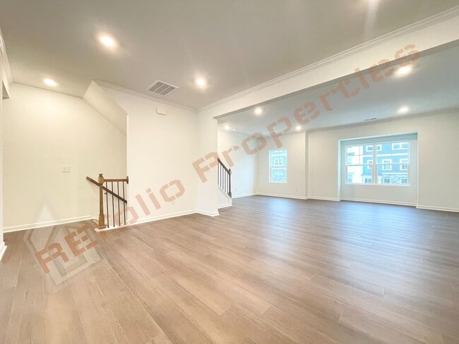 Building Photo - Brand New 3 Story, 4 bedroom, 3.5 bathroom Townhome Featuring a 1st floor Guest Suite, 2 Car Gara...