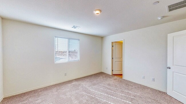 Building Photo - Cozy 2-story, 3BR 2BA townhome in a new community in North Las Vegas.