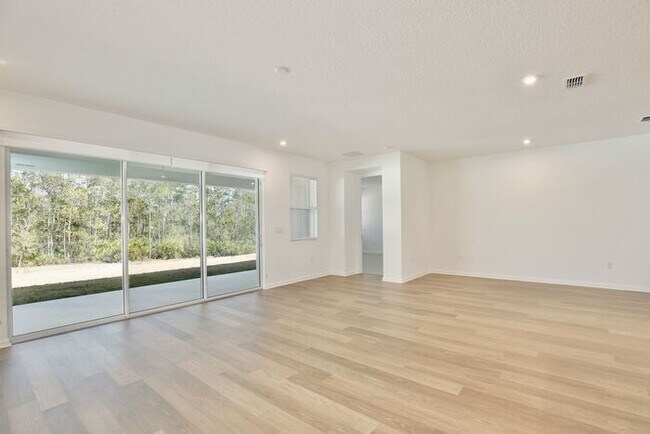 Building Photo - Thoughtfully Designed 4/3 Home with Premium Upgrades and 2 Car Garage! Available Now!