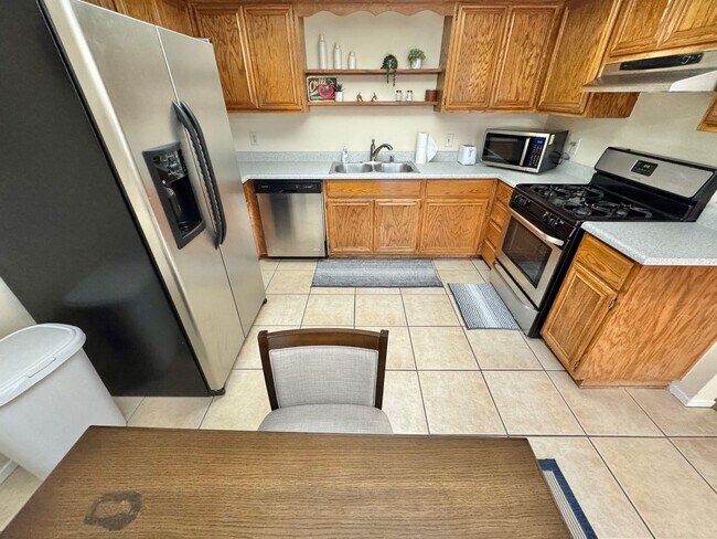 Building Photo - COMFORTABLE 2 BEDROOM, 2 BATHROOM FIRST-FL...
