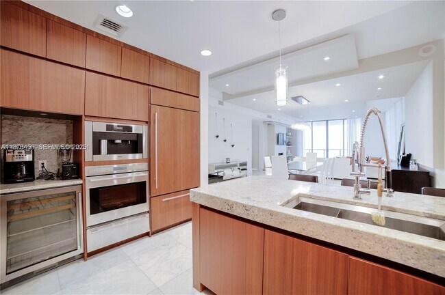 Building Photo - 9705 Collins Ave