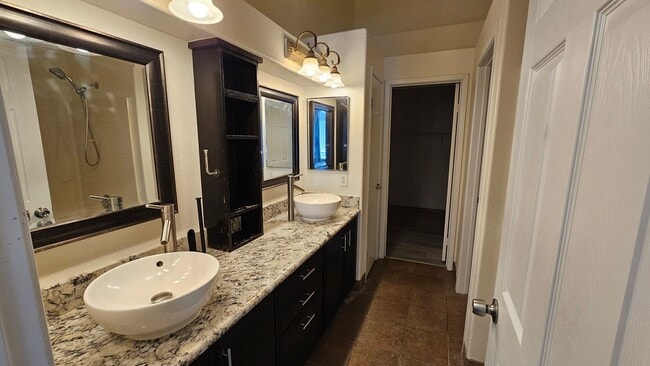 Building Photo - Partially Furnished 2/2 CONDO WITH  *BONUS DEN* & 2 CAR GARAGE!