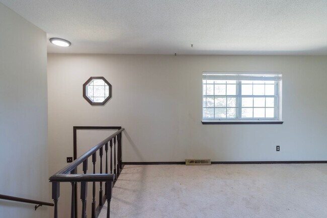 Building Photo - Charming 3BR Home-Screened Porch, Private Garage & Massive Backyard