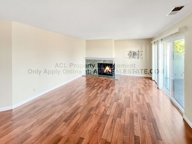 Building Photo - Bright 2BR/2BA Condo with Garage & Pool in...
