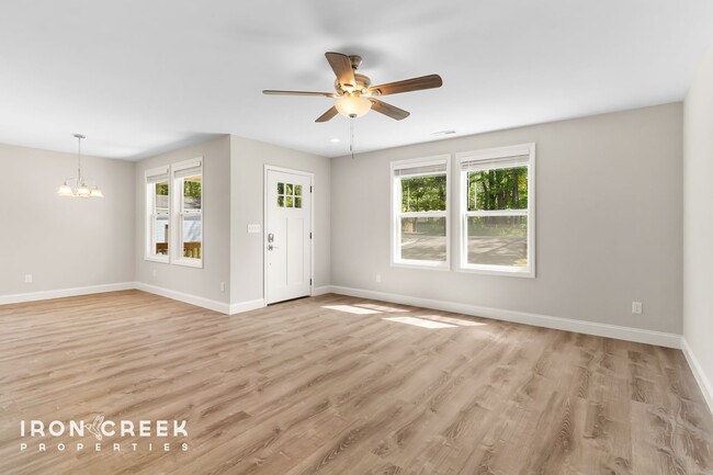 Building Photo - Bright and Modern: New Construction Three-...