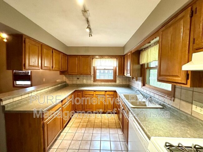 Building Photo - 1009 N 49th Ave