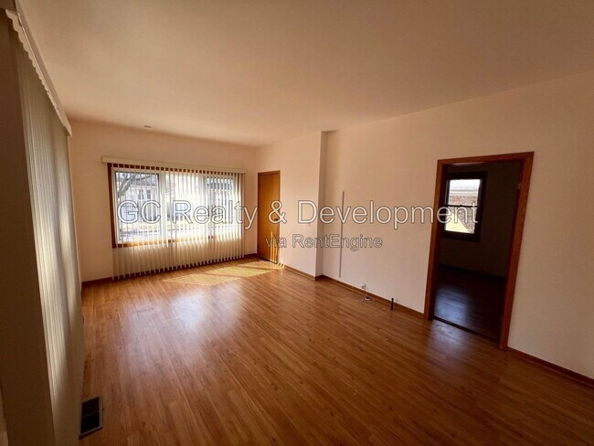 Building Photo - 4447 N Melvina Ave