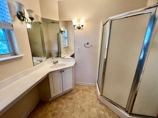 Building Photo - Beautifully Remodeled Corner Condo with Dual Primary Suites in The Villas at Bellamy