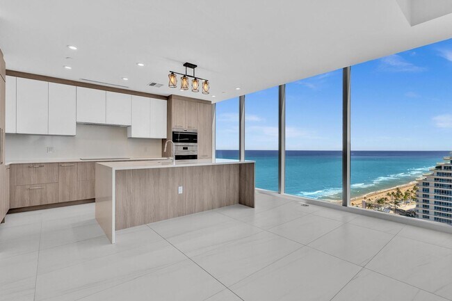 Building Photo - Stunning High-Rise Condo with Ocean Views | Prime Beach Location