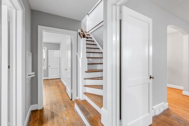 Building Photo - Brick home, Two Story, Hardwoods, DR, 2 Sun Rooms, FP, Carport!.