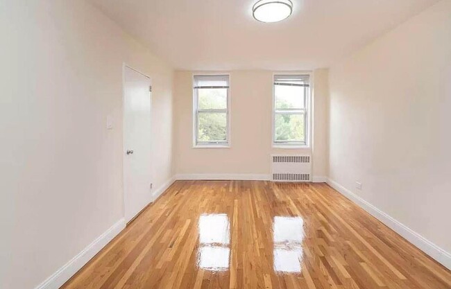 Building Photo - 55-05 Woodside Ave