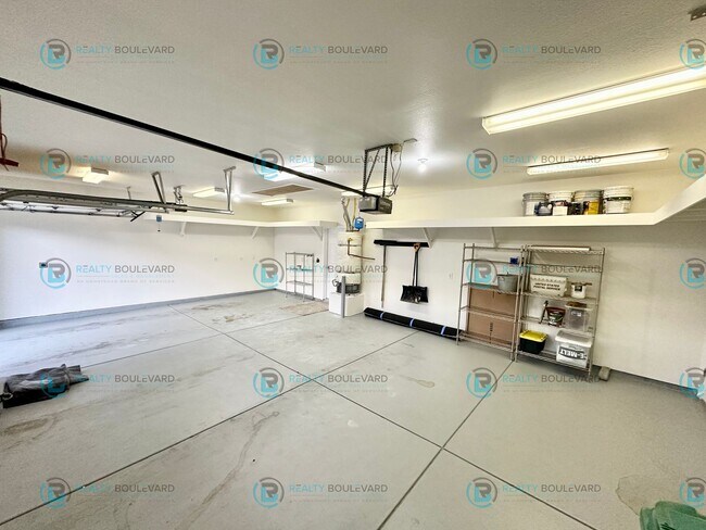 Building Photo - Open Kitchen, Expansive Living, and Covered Patio in Tranquil South Reno Near Trails, Parks & Sho...