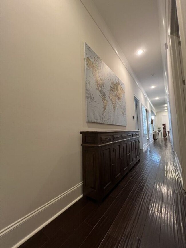 Building Photo - Luxury 4BR Home in Americana | 11 Ft Ceilings, Courtyard Living & Furnished Option