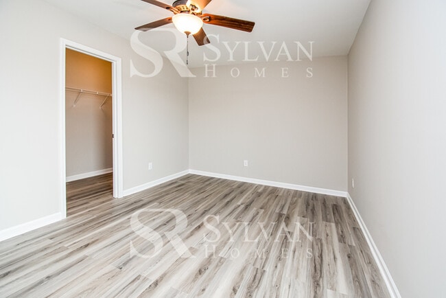 Building Photo - Feel welcome in this well-maintained 4BR 2...
