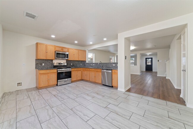 Building Photo - 8418 Village Rose Ln