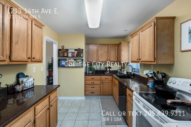 Building Photo - 1213 14th E Ave