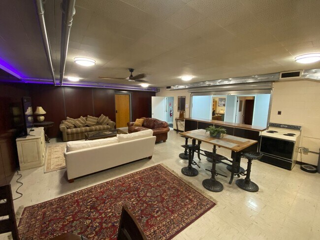 Building Photo - Furnished Loft-Style Apartment