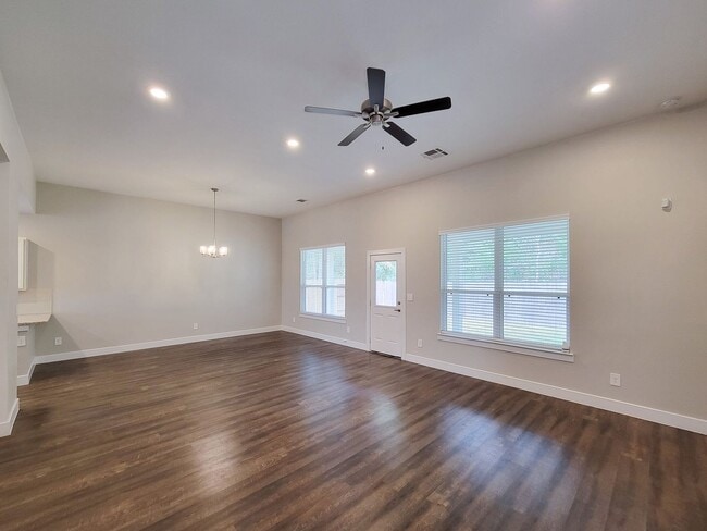 Building Photo - Very functional floor plan, has game room/home office, covered back patio on a big lot. Primary o...