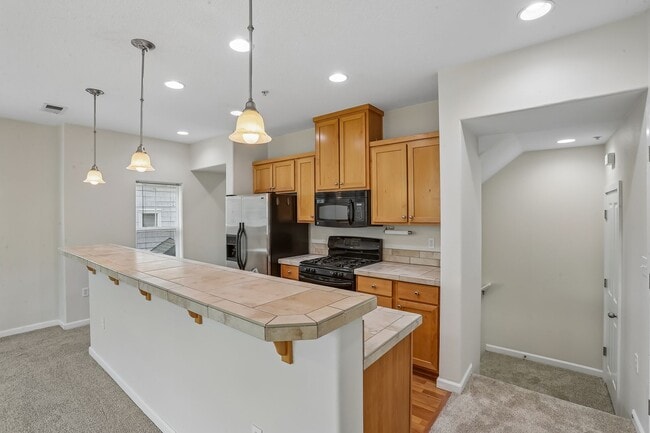 Building Photo - Dual-Suite 2BR/2.5BA Townhome-Style Condo — Gas Fireplace, Balcony & Attached Garage | Heron Cree...