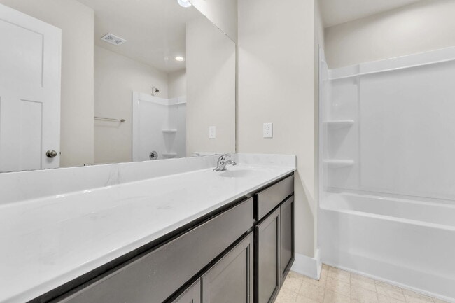 Building Photo - Beautiful 3 BR, 2.5 BA Townhome in highly ...