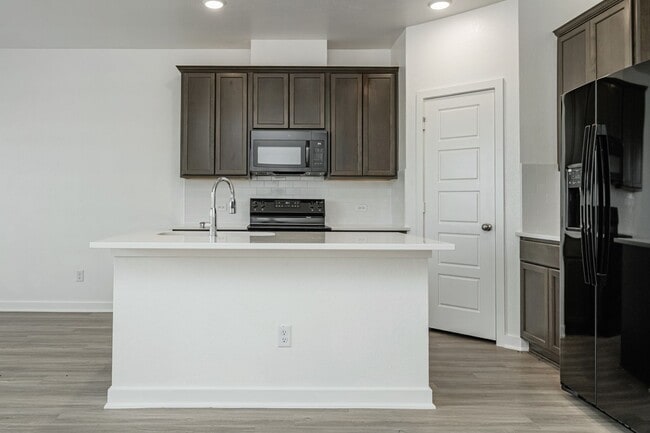 Building Photo - Where Style Meets Comfort: Elevate Your Li...