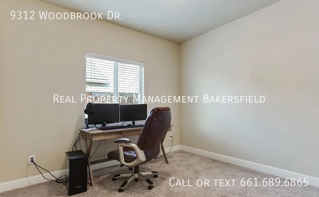 Building Photo - 9312 Woodbrook Dr
