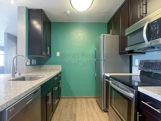 Building Photo - 6400 Christie Ave