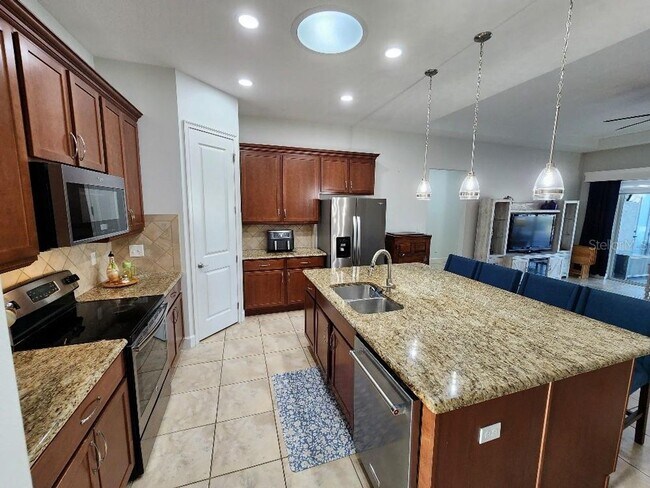 Building Photo - Beautiful Port Orange 4 Bedroom 2 Bathroom Pool Home