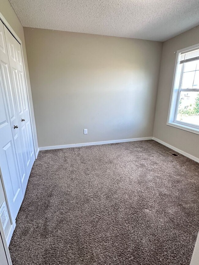 Building Photo - Champlin Corner Unit Town Home, 2 Car Garage, Dishwasher, Washer/Dryer, Balcony