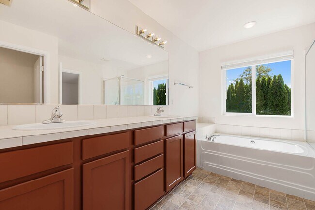 Building Photo - 3 Bedroom Home with Open Layout, Large Garage & Primary Suite